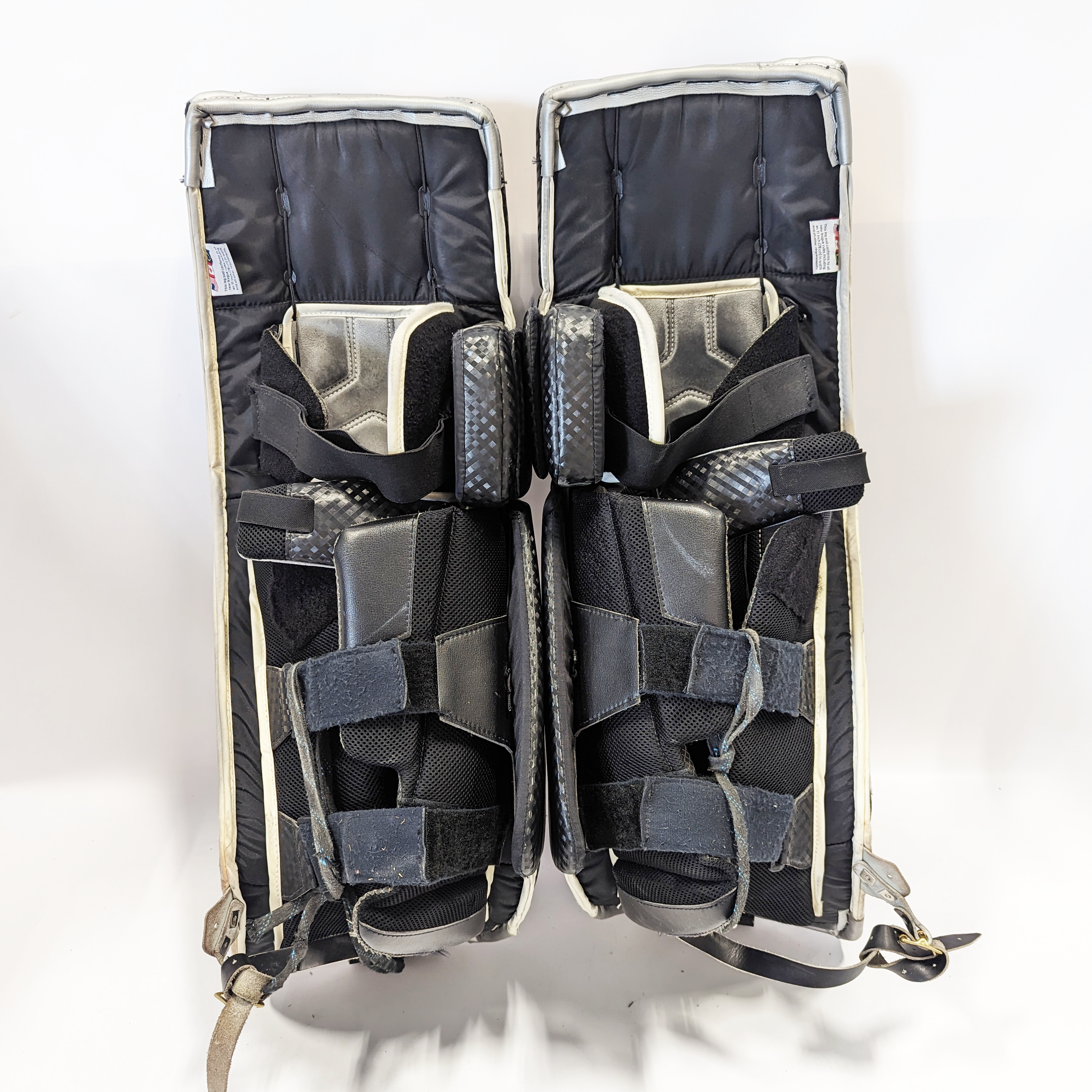 Vaughn Velocity VE8 - Jambières de gardien NCAA Pro Stock d'occasion (noir/orange/gris)