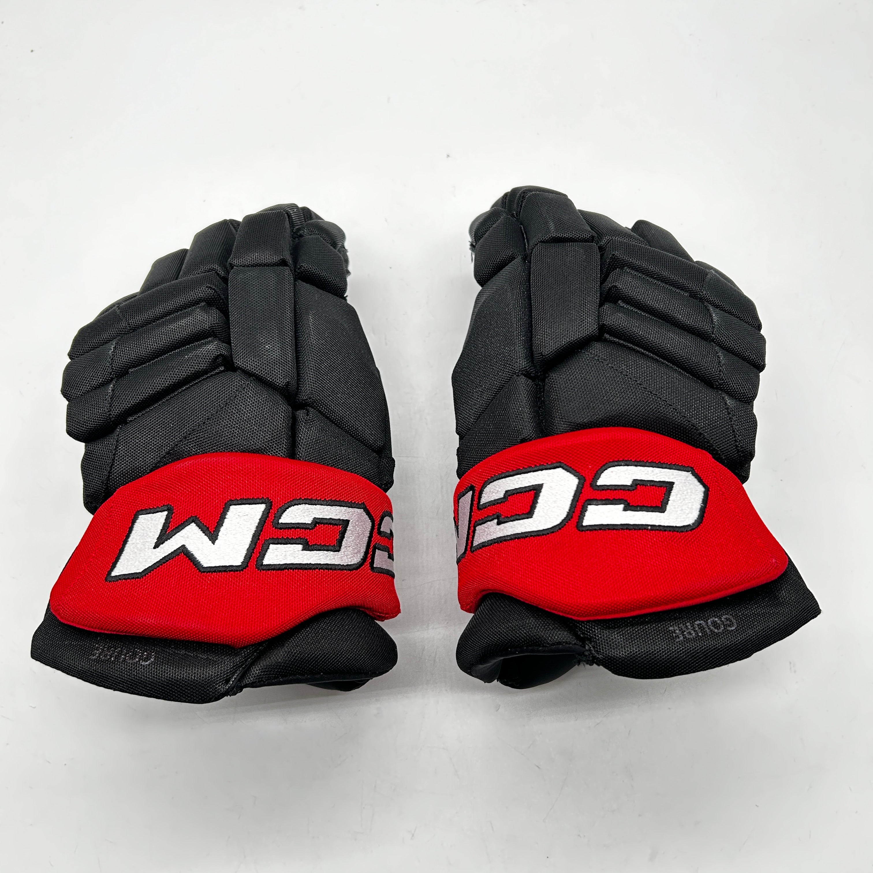 CCM HGJSCHL - Used Pro Stock Hockey Gloves (Black/Red)