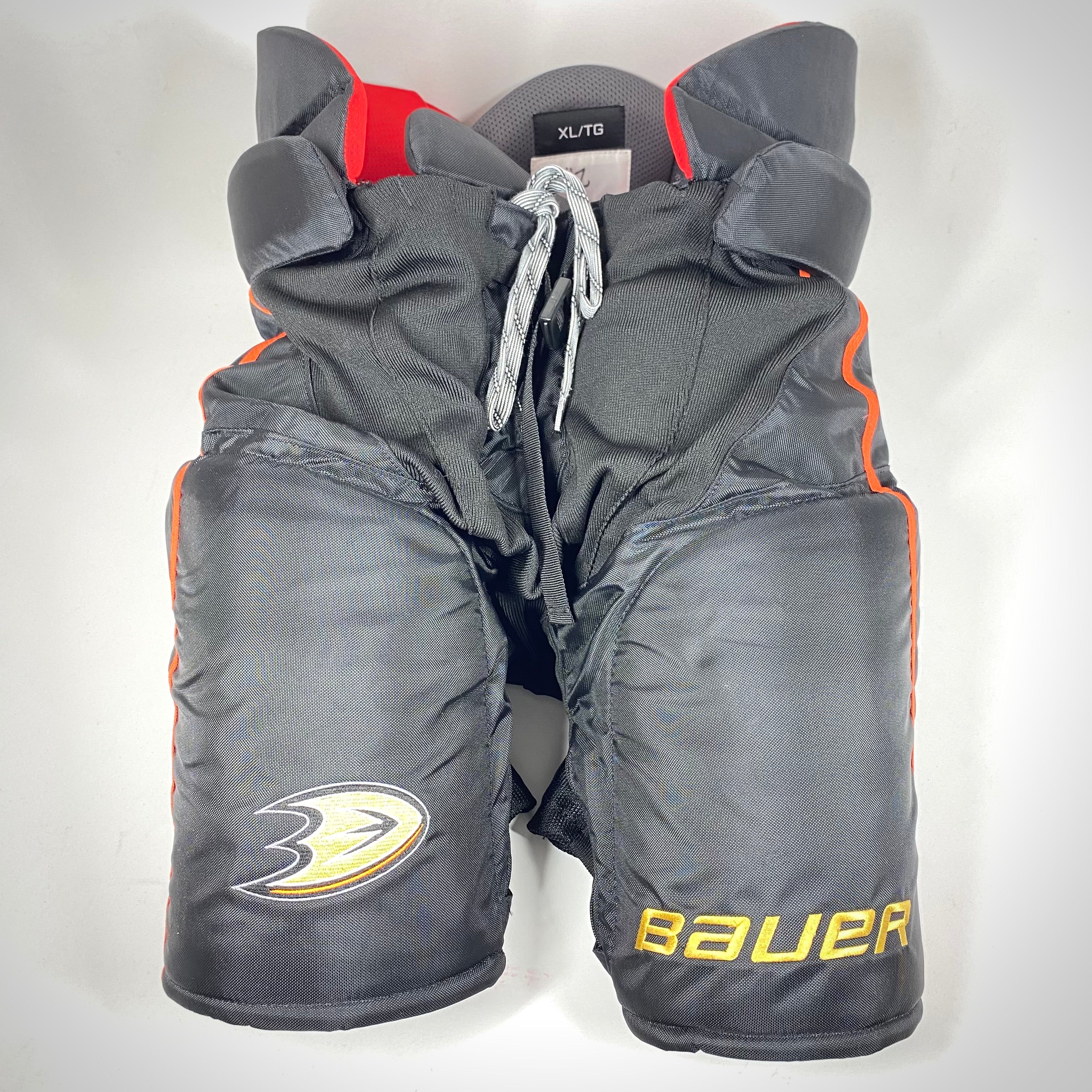 Pantalon de hockey Bauer Vapor - NHL Pro Stock - Ducks d'Anaheim (noir/orange)