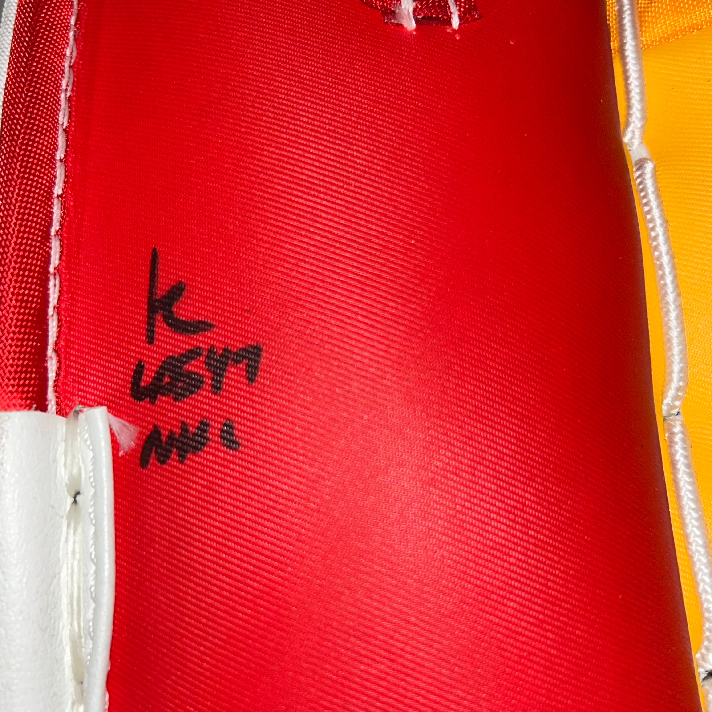 CCM Extreme Flex 6 - Used NHL Pro Stock Goalie Pads - Dustin Wolf (White/Yellow/Red)