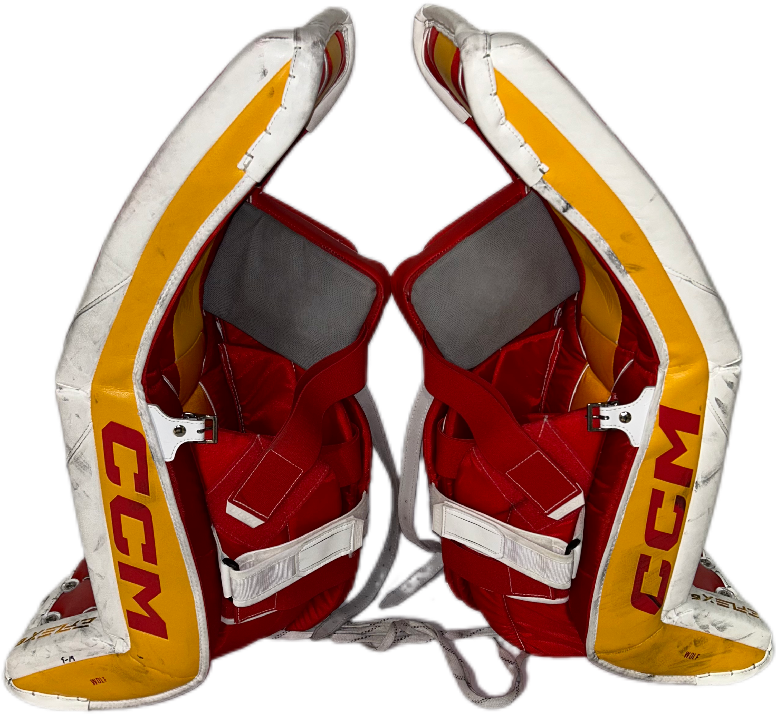 CCM Extreme Flex 6 - Used NHL Pro Stock Goalie Pads - Dustin Wolf (White/Yellow/Red)