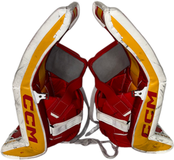 CCM Extreme Flex 6 - Used NHL Pro Stock Goalie Pads - Dustin Wolf (White/Yellow/Red)