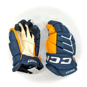 CCM HGJSXP - Gant NCAA Pro Stock (bleu marine/jaune)