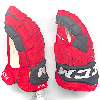 CCM HGPJS - Gant NHL Pro Stock d'occasion - Steven Lorentz (rouge/noir)