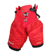 Bauer Nexus - Pantalon de hockey Pro Stock NCAA pour femme (rouge/noir)